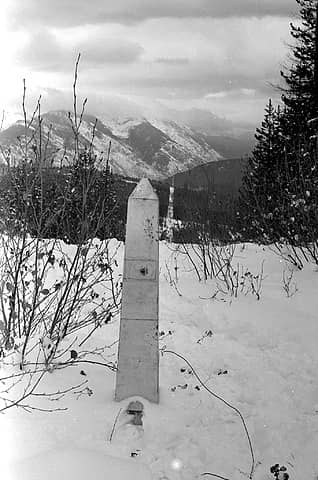 A Border Monument and the Border strip looking east from Boundary Ridge