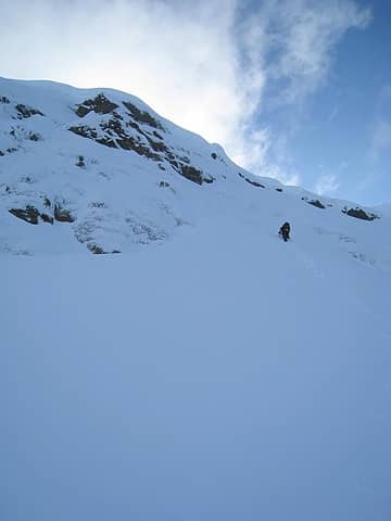 tom decides it would be wise to put on crampons before he steps onto the 65 degree part of the climb