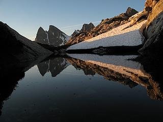 Picket Pass Tarn at sunrise, with McMillan Spires