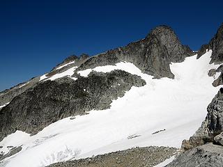 The route down from the west col (take rock down between the two snowfields on the cliff, then follow rock along the base of the righthand snowfield till it reaches the main snow basin)
