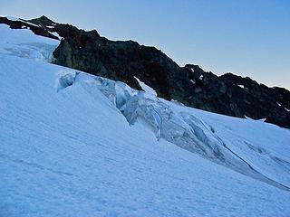 Early morning ascent up Quien Sabe Glacier. Sahale Peak up to the left.