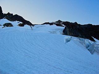 Early morning ascent up the Quien Sabe Glacier.Sahale Peak just right of center.