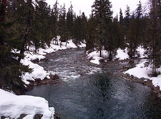 Cle Elum River with cabins.
