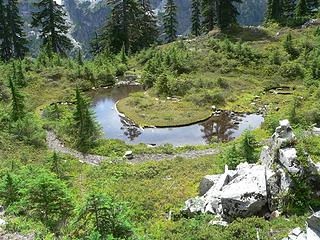 Unusual pond along trail from Snow Lake to Gem Lake.