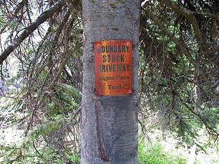 old sign in the forest above the hunters camp