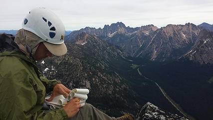 Gimpilator examines the summit register on Whistler Peak
