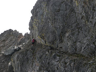 Neil crossing the exposed ledge