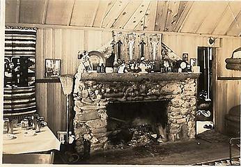Smith Place - Queets Valley - 1930s - View of north wall of Smith addition. Note stone fireplace, Navajo rug and wall hangings. photo courtesy S. Martinson