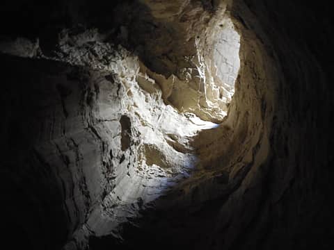 Looking up to the skylight @ the end of the slot cave