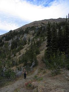 Trail at Marmot Pass. Boot path ascends slopes in center to ridgeline.