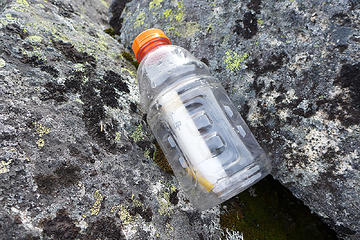 Mile High summit register. Placed by Fay Pullen in 2007. Later it got wet and a hiker-that-will-not-be-named dried it out but lost the cap, hence the capless PVC tube inside a gatorade bottle. So far it's working well.