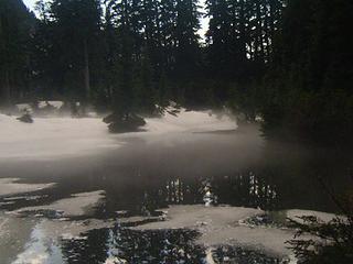 Tarn above Lake Josephine - mist and reflections
