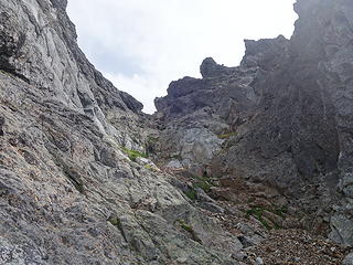 Descending the gully rightwards between Slesse and the big spire