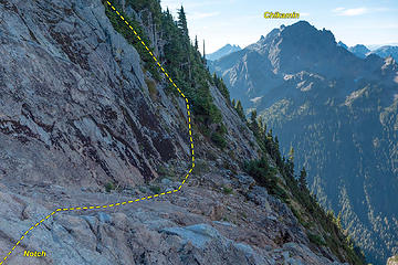 On the south side of the notch a ledge leads to a scramble up and left 300' to the summit.