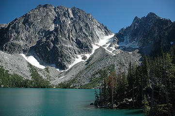 Glacial blue waters of Colchuck Lake with Dragontail and Colchuck Peak