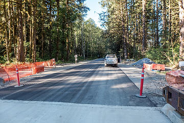 Big Blowout Creek bridge with new pavement starting from the far end of the bridge