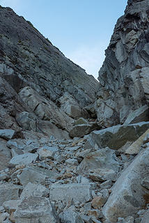 Closer to the gully leading up to the notch. There appear to be big rocks blocking progress. Can we scramble up it?