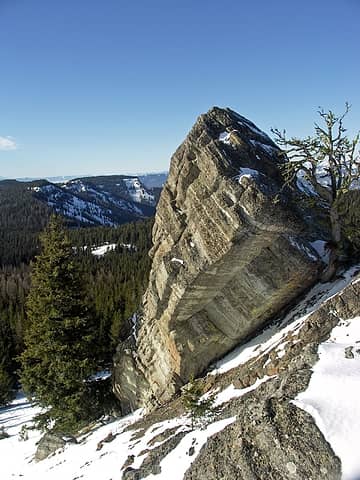 Rock formation on Lillian Ridge with Diamondhead Mtn. in the background.
