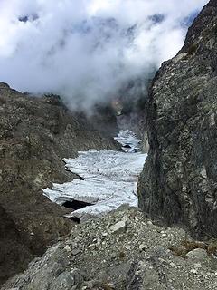 Looking down at glacier remnant, steep drop