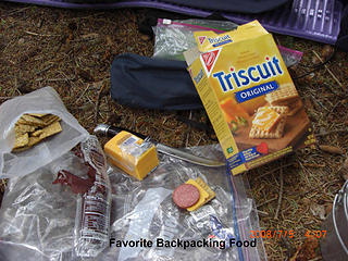 a malamutes favorite trail snack,sausage,cheese and crackers