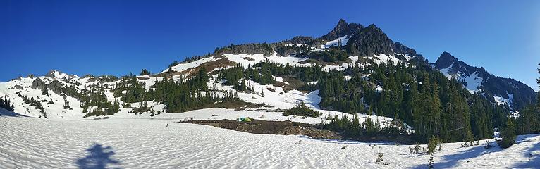 Lake of the Angels (under snow), some backpackers, and Mount Stone