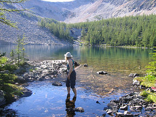 Goforth showing her hand fishing method in Dot Lake outlet.