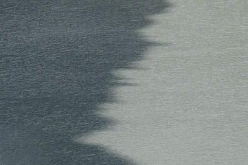 Mystery Shadow on Glacial Lake