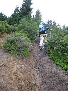 Matt tackles a steep and muddy section of the trail