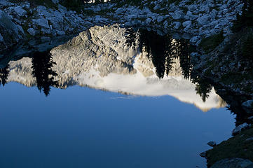 Snowking reflected in a tarn