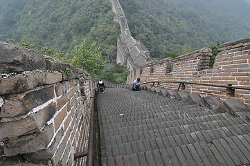 Stacey and our tour guide Rosemary making their way up the steep staircase on the Great Wall, one step at a time.