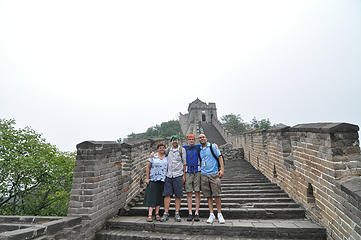 Everyone poses on the Great Wall and I mean everyone.  Sometimes you can't make your way through crowded sections cause there is a group posing on one of the narrow stairways.  Our guide took this photo of us.