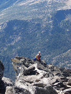 Kyled looking for route across false summit ridge.