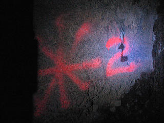 Strange hieroglyphics adorn the walls; a remnant, perhaps, of the tunnel's prehistoric inhabitants.