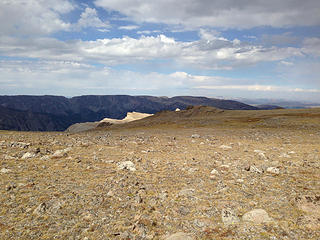 Although called a "Peak", it's more of a vast plateau. White Rock is lit in the background.