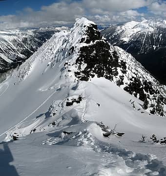 Stitched shot of our tracks on the ridge and up to the col