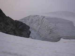 Route crosses the rocky ridge at the left side of the glacier to gain easier terrain leading to the summit