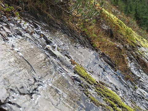 Polished striated bedrock. These features can also occur on individual loose blocks carried by ice.