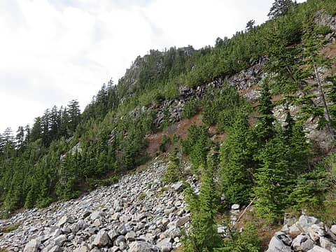 You could also  traverse across the lower part of this talus slope to go left of the minor cliffs and straight up.