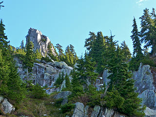 I traversed right under the dramatic rock tower above Rainy Lake and came out at the much smaller Upper Rainy Lake.