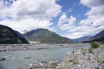 Looking towards the Lillooet Meager Confluence in July 2017. The slide came down from the summit at left into Meager Creek and then blew out debris into the area in the foreground. A severe forest fire affected this area in 2015 to add to the ambiance.