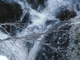 Ice branches and small waterfall