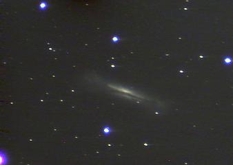 NCG 3628 is 35,000,000 light years distant.The galaxy is seen edge on and the effects of tidal interactions with two galaxies which lie slightly out of frame are evident in the tweaked dust lanes at the edges. ST90, 32 minutes