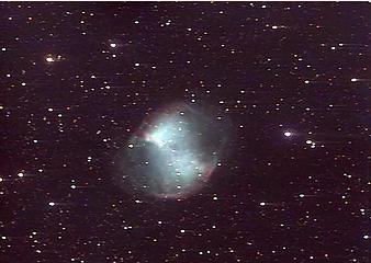 The famous Dumbell Nebula, M27 in Vulpecula. This is the gas shell ejected by a dying star, carrying heavy elements which will enrich the galactic medium and create new planets and stellar systems.