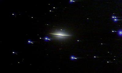 The famous Sombrero galaxy (M104). I bumped the mount at some point during the run and the bright stars show this screwup. I'll be back for more, this thing is cool looking.