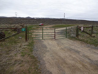 This gate is located about 150 yards east of MP 13 on the Vantage Highway. It is not locked but there is a chain to keep it closed.