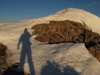 Morning shadow on the summit (and the moon still up)