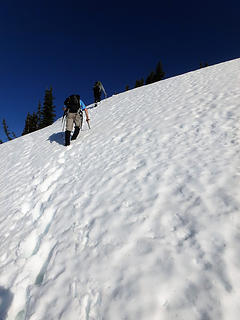 Ascending steep snow along ridge