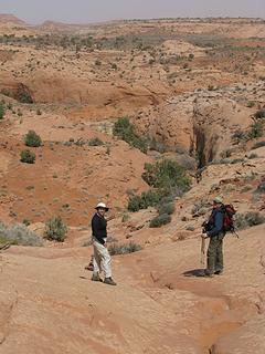 Liz and Anne descend into Dry Fork Coyote Gulch