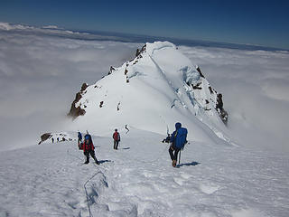 Colfax and climbers above the clouds