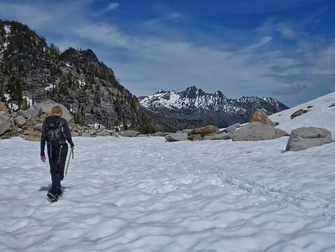 Jake walking off the Colchuck Glacier, Cashmere in the back
